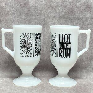 2 Vintage Milk Glass "Hot Buttered Rum" Pedestal Mugs With Black Floral Design